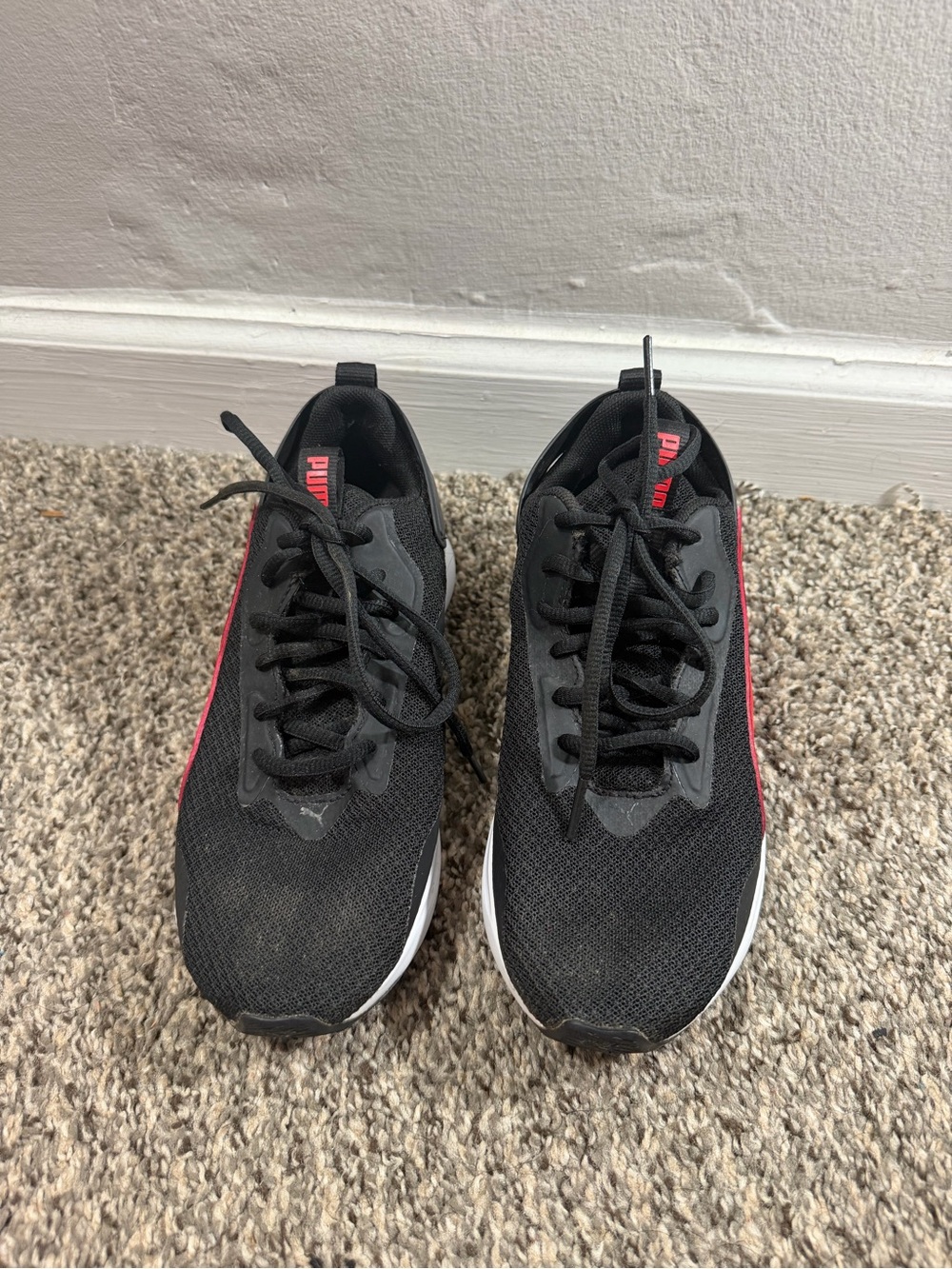 Puma Kids Black Athletic Sneakers with Pink Accents